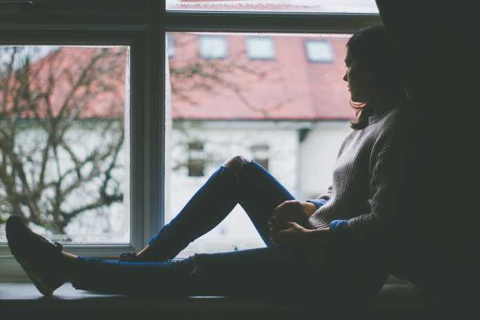 Sad woman young person mental health depressed anxiety
